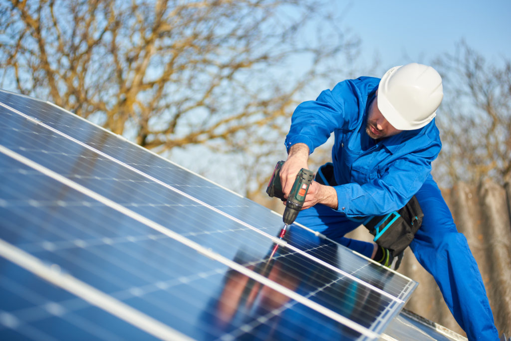 Image of solar panel installer for our ranking of highest paying trades